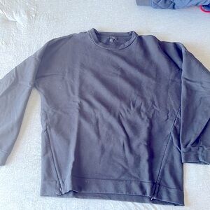 COS MENS sweater has two zippers at bottom.Size: M Color: Black